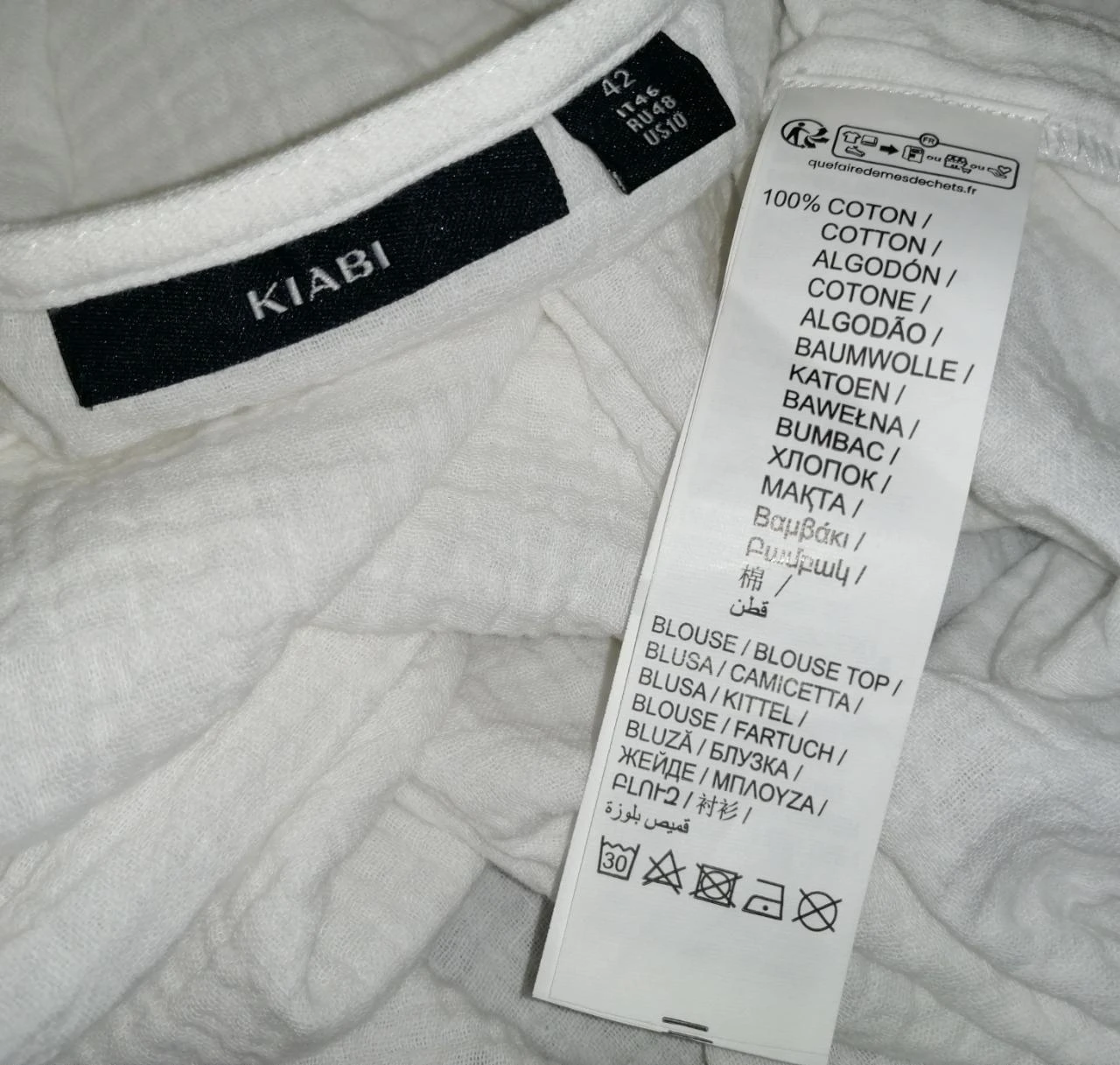 Blusa branca corte babydoll gaze de algodão texturizado "Kiabi" – photo 3